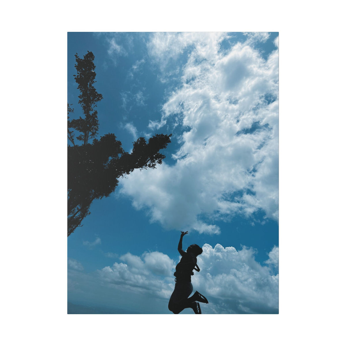 Silhouette Jumping Against Cloudy Sky - Classic Stretched Canvas