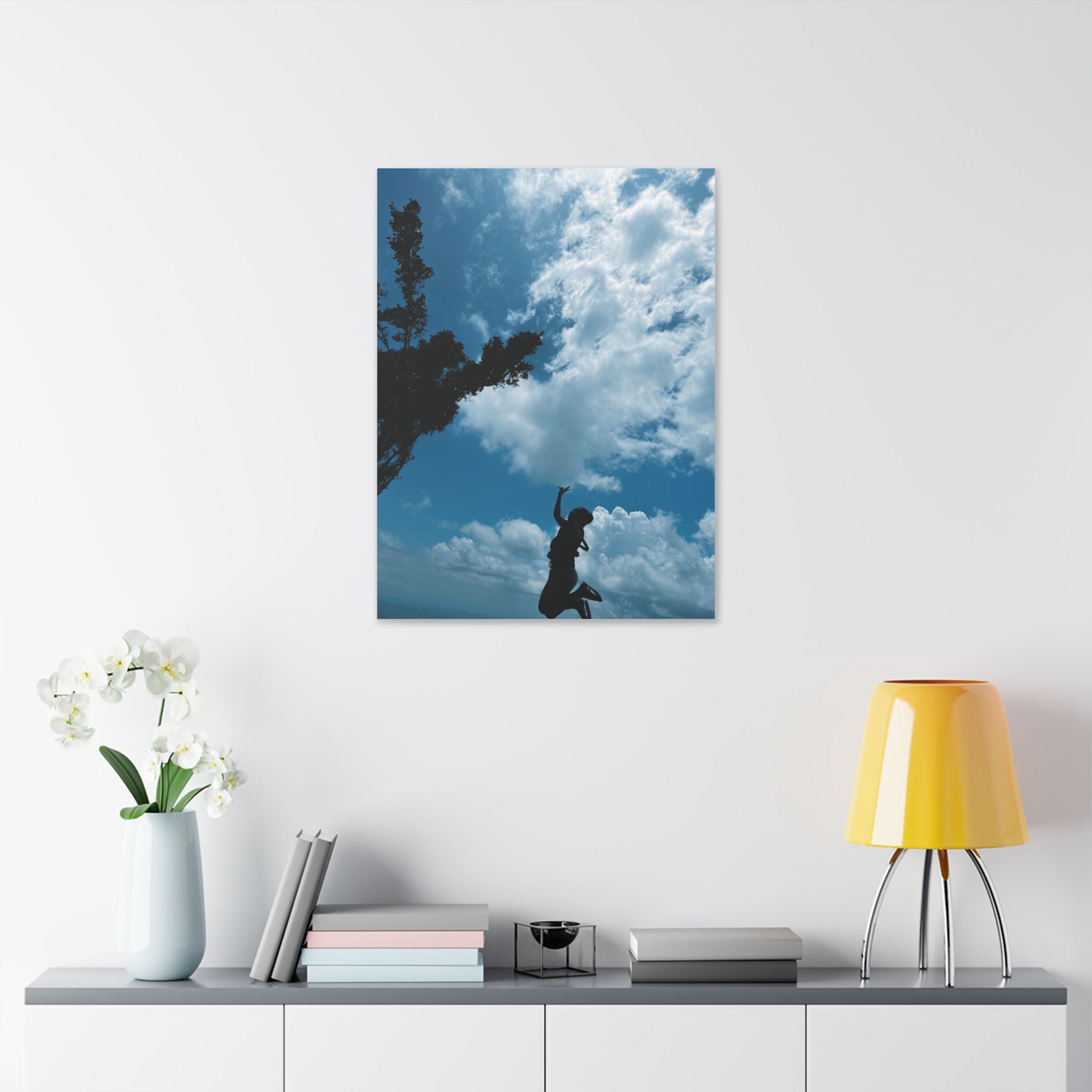 Silhouette Jumping Against Cloudy Sky - Classic Stretched Canvas