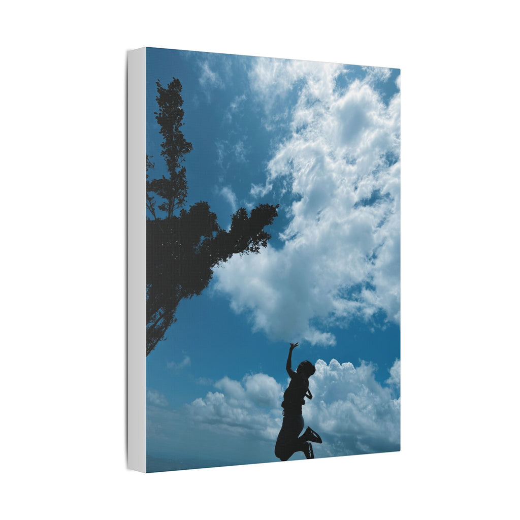 Silhouette Jumping Against Cloudy Sky - Classic Stretched Canvas