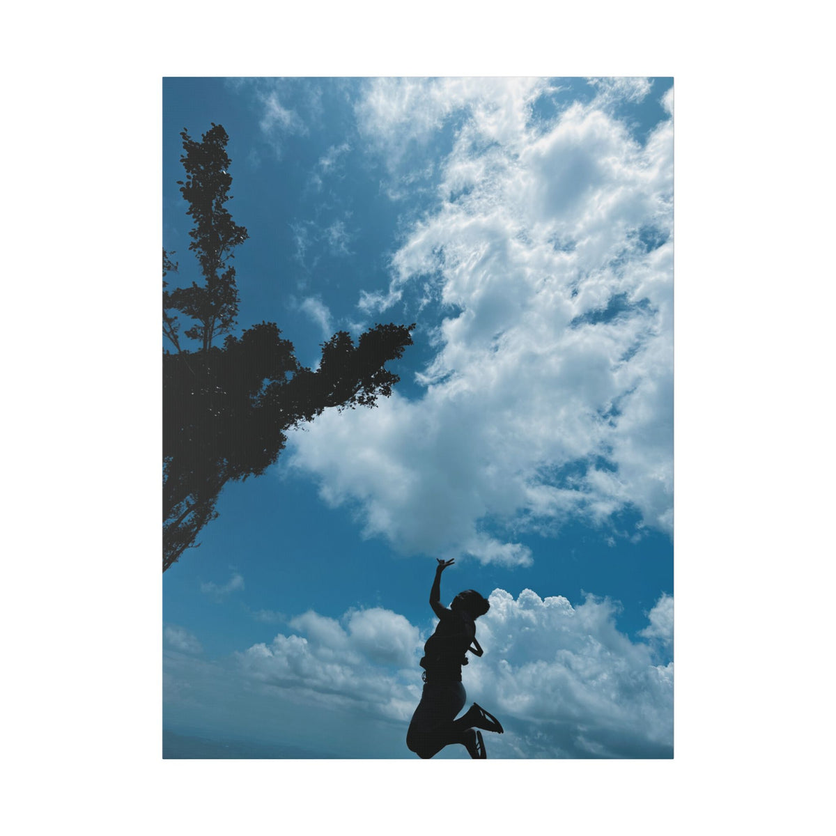 Silhouette Jumping Against Cloudy Sky - Classic Stretched Canvas