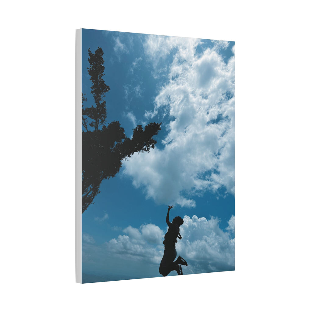 Silhouette Jumping Against Cloudy Sky - Classic Stretched Canvas